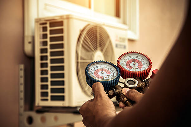 Professional Heat Pump Repair technician working in Port Charlotte, FL